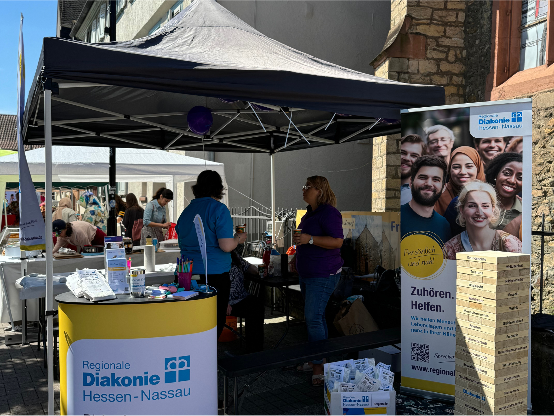 Stand der Migrationsdienste auf dem Interkulturellen Fest Bensheim 2024